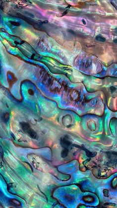 an abstract painting with blue, green and purple colors