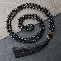 Beaded -New Natural Black Obsidian Stone Necklaces Men Shiny Black Onyx 108 Mala Beads Necklace Women Buddhist Prayer Yoga Jewelry Gifts Necklace Type: Pendant Necklaces Material: Semi-precious Stone Item Type: Necklaces Gender: Unisex Fine or Fashion: Fashion Model Number:3256804670368873 Product Description: Bracelets Type: Beaded Bracelets/Necklace Bead Material: Natural stone Style: Fashion/Classic Color: 1Color Perimeter: 70-80CM(Elastic) Fine or Fashion: Fashion Casual Shape\pattern: Round Chain Type: Braided Rope Note: 1.We have a favorable price, and support retail and wholesale. 2.We have our own factory and support the custom product, 3.Please send the picture that we can make the unique product according to your request. 4.If you need other different size,please contact us befor Necklaces Men, Black Obsidian Stone, Stone Necklaces, Mala Bead Necklace, Buddhist Prayer, Necklace Bead, Obsidian Stone, 108 Mala Beads, Tassel Jewelry