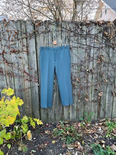 These pants are incredible and will give you an amazing 70's look. They are in great condition and have no rips, holes, stains or smells. They are a darker green color with a hint of blueish. Measurements: laying flat and doubled  Waist: 37 inches  Hips: 44 inches  Rise: 11 1/2 inches  Inseam: 29 inches  Length: 39 inches  Size on tag: no tag size (measure like XL, check measurements for best fit) Vintage Bottoms With Pockets And Straight Hem, Retro Bottoms With Relaxed Fit And Straight Hem, Vintage Bottoms With Straight Hem For Fall, Retro Bottoms With Straight Hem For Spring, Retro Spring Bottoms With Straight Hem, 70s Look, Vintage Vans, Pleated Pants, Vintage 70s