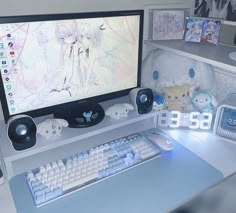 a desktop computer sitting on top of a desk next to a keyboard and mouse pad