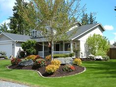 a house with landscaping in the front yard