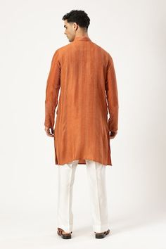 Rust brown chanderi silk kurta with horizontal stitch embroidery and geometric georgette fabric applique on the chest and sleeves. - Aza Fashions Traditional Brown Kurta For Eid, Brown Traditional Drape Kurta For Eid, Straight Chanderi Kurta With Woven Motifs, Brown Straight Kurta For Diwali, Chanderi Straight Kurta With Woven Motifs, Festive Brown Kurta With Chikankari Embroidery, Brown Chikankari Embroidery Kurta For Eid, Festive Brown Chanderi Kurta, Brown Kurta With Resham Embroidery In Traditional Drape