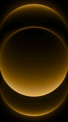 an abstract yellow and black background with circles in the shape of two rings on top of each other