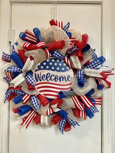 a patriotic wreath with the words welcome on it