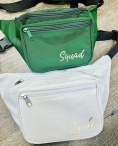 a green and white fanny bag sitting next to a white purse with the word squad written on it