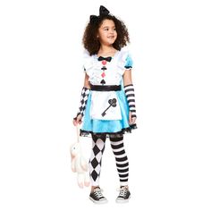 A quirky twist on the traditional Alice in Wonderland costume, this 4 piece set includes a pretty blue dress with attached apron. It has cute puff sleeves, a bow at the neck, and black net trim around the hem. The footless tights and matching arm warmers feature black and white stripes and a chequered pattern. There's even a black bow headband to complete the look - perfect for World Book Day. Material: 100% Polyester.  Care: Sponge clean only. Alice In Wonderland Fancy Dress, Fancy Dress Costumes Kids, Pretty Blue Dress, Baby Fancy Dress, World Book Day Costumes, Book Day Costumes, Girls Fancy Dress, Alice In Wonderland Costume, Wonderland Costumes