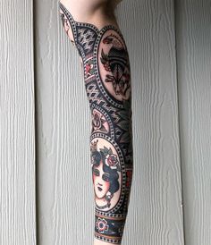 a woman's arm with tattoos on it