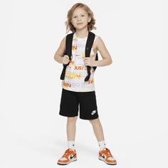 This 2-piece set is our take on the classic PE uniform. The graphic tank is made of smooth cotton jersey with lots of Swoosh love on display. The matching French Terry shorts are lightweight with a stretch waistband for comfy wear kiddos can run, jump, crawl and play in. Sporty Sleeveless Top For School, Sporty Tops For School In Summer, Sporty Tops For Summer School, Sporty Summer Tops For School, Black Sleeveless School Top, Nike Cotton Summer Activewear, Nike Cotton Activewear For Summer, Nike Summer Activewear, Sporty Cotton Activewear For Play