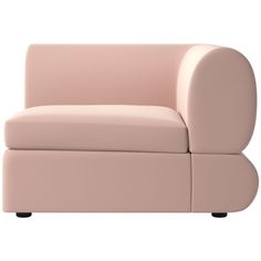 a pink couch sitting on top of a white floor next to a black legrest