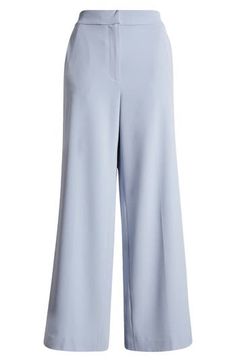 Wide legs lend graceful movement to trouser-inspired pants made with an elasticized back waist for added comfort. 29" inseam, 22" leg opening; 14" front rise; 17 1/2" back rise (size 8) Zip fly with hook-and-bar closure Front slant pockets 63% polyester, 33% rayon, 4% spandex Machine wash, tumble dry Imported Blue Ankle-length Wide Leg Pants For Business Casual, Elegant Blue Wide Leg Pants With Elastic Waistband, Elegant Relaxed Fit Blue Bottoms, Elegant Blue Relaxed Fit Bottoms, Graceful Movement, High Waist Wide Leg Pants, Wide Legs, Slate Blue, Wide Leg Trousers