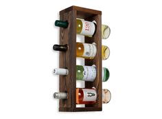 a wooden wine rack with several bottles in it