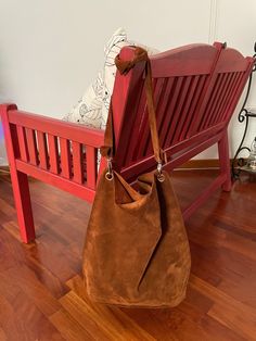 The hobo style of this Hobo Bag Leather offers a relaxed, soft look, while its shape ensures it's roomy enough to fit all your essentials.  The Suede Hobo Bag is equipped with a long shoulder strap. You can tie a knot at the shoulder strap, this allows you to wear it over the shoulder or crossbody, providing a comfortable, hands-free option. This Brown Hobo Bag is crafted with the finest quality Italian suede known for its softness, durability and unique texture. Suede is made from the underside Brown Hobo Shoulder Bag For On-the-go, Hobo Shoulder Bag With Adjustable Strap, On-the-go Hobo Bag With Adjustable Strap, Brown Hobo Shoulder Bag With Large Capacity, Brown Large Capacity Hobo Shoulder Bag, Large Capacity Brown Hobo Shoulder Bag, Brown Baguette Bag With Leather Handles For Everyday, On-the-go Hobo Shoulder Bag With Detachable Handle, On-the-go Hobo Bag With Detachable Handle