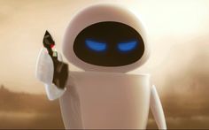 a white robot with blue eyes holding a black object