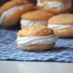 several pastries sitting on top of a blue and white towel