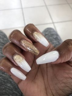 White and gold elegant nails White Nail With Gold Design, White And Gold Sparkle Nails, Gold Tone Nails, New Years Nail Designs White And Gold, White And Gold Nail Designs Almond, White And Golden Nails Acrylic, White And Gold Glitter Nails, Gold And White Almond Nails, White Nails With Gold Glitter