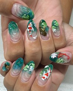 Get inspired by these stunning summer nails featuring a beautiful koi fish and water lily design. This intricate nail art is perfect for a touch of elegance and whimsy this season.  #summernails #koifishnails #waterlilynails #nailart #summernailart #nailinspiration #naildesigns #beautifulnails #creativenails #uniquenails #nailtrends #summertrends2024 #nailpolish #manicure #pedicure #nailcare #nailsofinstagram #nailstagram #nailholic #nailjunkie Asian Inspired Nail Art, 3d Koi Fish Nails, Scenic Nail Art, Cancun Nails Ideas, Ocean Waves Nails, Botanical Nails Designs, Pond Nail Art, Koi Fish Nails Acrylic, Koi Nails Designs