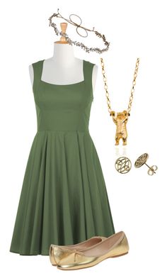 a green dress with gold shoes and a necklace