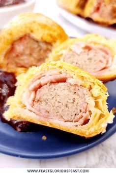 ham and cheese stuffed pastries on a blue plate