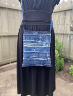 a woman's dress made out of old jeans