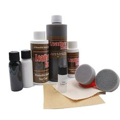 the contents of a leather care kit including polish, sanding sponges and other items