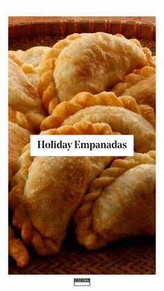 some food that is in a basket with the words holiday empanadas on it