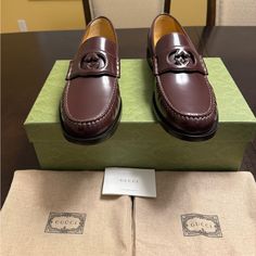 New Authentic Gucci Gg Logo Leather Loafers In Perfect Condition. Never Worn. Shoe Features Large Gg Logo On The Top Comes With Box / Dust Bags / Information Cards Color Bordeaux Red Size Uk 11 Or Us 11.5 Men’s. Shoe Tagged In Uk Size. Luxury Loafers With Red Sole And Plain Toe, Luxury Loafers With Red Sole, Gucci Luxury Leather Dress Shoes, Luxury Gucci Leather Dress Shoes, Gucci Brown Loafers With Rubber Sole, Brown Gucci Loafers With Rubber Sole, Gucci Calf Leather Loafers With Round Toe, Luxury Gucci Dress Shoes With Leather Sole, Gucci Classic Dress Shoes With Round Toe