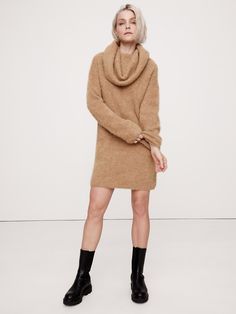 An invitation to play with proportions, this soft and warm sweater dress is cut with an oversized silhouette and a dramatic, funnel neck so you can drape and style as you please.  For fabric, we reached for one of our favorite fuzzy yarns, spun from a blend of luxurious alpaca.  Oversized fit.  Funnel neck.  Slip-on styling.  Unlined.  Oversized fit.  Long sleeves.  Above-knee length.  Model: Size S, 5'10" (178cm). Cinnamon Dolce Latte, Cinnamon Dolce, Invitation To Play, Warm Sweater, Warm Sweaters, Oversized Silhouette, Funnel Neck, Funnel, Oversized Fits