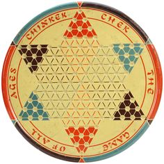 an old tin tray with geometric designs on the side and words written in red, blue, and yellow