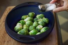 the brussel sprouts are being prepared to be cooked