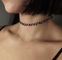 Naamah. Inspired by the extreme beauty of Naamah. This beautiful choker necklace is composed of solid 925 sterling silver and sparkling 2mm spinel gemstones. Ideal for a witchy/gothic, yet minimalist look. You can choose between 3 chain lengths: 12 / 13 / 14 inches Not sure which length to buy? We can add a 1 inch extender chain. Just write a note at checkout! ❈ We send all our items with registered mail. ❉ Due to the organic nature of stones, there might be a slight variation in colour, size and shape. ✺ All items come packaged in a quality velvet pouch ready for gift giving. ✽ If you want to make a special order, just contact us! Black Jewelry Aesthetic, Dark Accessories, Witchy Accessories, Extreme Beauty, Dark Necklace, Gothic Choker Necklace, Gothic Choker, Dark Jewelry, Beautiful Chokers