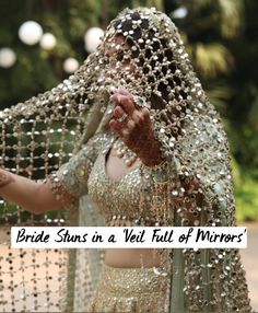 a woman in a veil with beads on her head and hands behind her are the words, bride stunts in a veil of mirrors