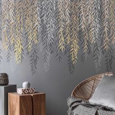 the wallpaper in this room is decorated with metallic leaves