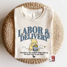 a t - shirt that says labor and delivery on it with a bear holding a bucket