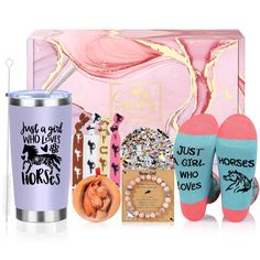 a pink gift box with socks, coffee mug and other items for women's day