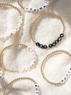 The simple words "You Matter" are a powerful reminder that you are seen, heard, and cherished just as you are. Whether you're celebrating victories or navigating challenges, never forget the profound impact you have on the world around you. You matter more than you know. As a heartfelt bonus, each bracelet is accompanied by a card insert, inscribed with a message that'll warm your heart, ready to uplift or be shared with someone special who needs to hear it too. 💕 We've crafted this bracelet with gold-filled beads, ensuring that you can wear your reminder throughout the day without worry of tarnishing. Whether you're doing the dishes, applying hand lotion, or sweating it out in hot yoga, this bracelet is designed to endure alongside you. Product Details Hand-crafted with love in Massachus Inspirational Beaded Bracelets For Gifts, Inspirational Letter Beads Jewelry For Friendship, Personalized Inspirational Beaded Bracelets, Meaningful Letter Beads Jewelry For Friendship, Meaningful Faith-inspired Bracelet Jewelry, Personalized Inspirational Friendship Bracelets, Inspirational Personalized Bracelets For Friendship, Inspirational Gold Name Bracelet For Friendship, Inspirational Personalized Friendship Bracelets