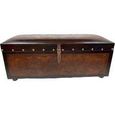 an old wooden trunk with metal studs on the top and bottom, sitting against a white background