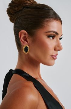 Elevate any outfit with the Azra earrings, the ultimate IT girl accessory. Made from metal and resin, these ellipse shaped earrings have a stud fastening with butterfly backing. The smooth stone centre is complemented by a textured gold frame. 



Colour: Black/Gold.

Metal and resin.

Stud fastening.

Butterfly backing.

Smooth stone centre.

Textured gold frame.

Ellipse shape.

 Size: ONE SIZE Ellipse Shape, Split Long Dress, Maxi Dress Sale, Maxi Dress Navy, Jumpsuit Shorts Rompers, It Girl, Gold Texture, Romper Pants, Tank Top Cami