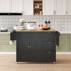 a kitchen island with food and drinks on it