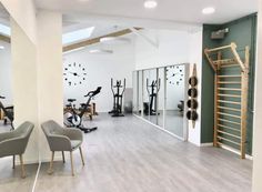 the gym is clean and ready for people to use it as an exercise center in this modern apartment