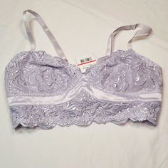 Lavender Bralette With Hook And Eye Closure. Adjustable Straps. Fully Lined. Pretty, Scalloped Lace Detailing With A Satin Trim. 90% Nylon And 10% Spandex. Hand Wash. Fitted Lavender Bra For Spring, Purple Fitted Bra For Spring, Feminine Fitted Lavender Bra, Lavender Feminine Bra, Spring Purple Lace Bra, Elegant Purple Summer Bra, Elegant Purple Bra For Spring, Free People Bralette, Free People Intimates