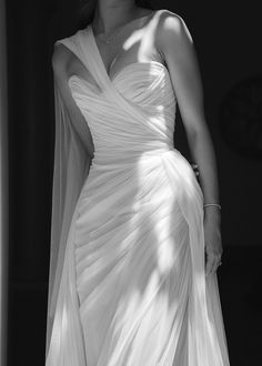 black and white photograph of a woman in a wedding dress