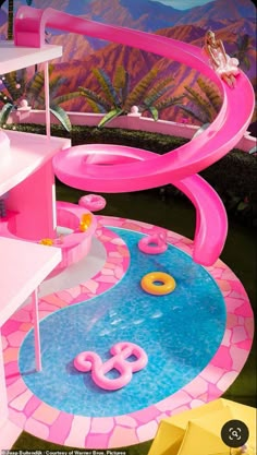 an inflatable barbie doll house with pool, slide and play area for kids