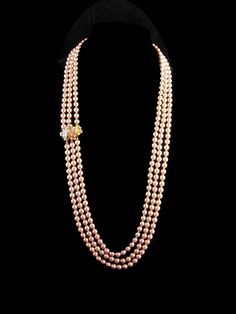 This is even more fabulous in person. This heavy hand knotted pearl ( never worn ) champagne color glass pearl necklace is exquisite. . The clasp can be work at the side or back. IT is large relief rose gold plated and silver plated flowers with a hidden slide in side catch. . See photos for size and more views/ You won't be disappointed, it is a nice high end necklace/ 9-3-20 Elegant Double Strand Pearl Necklace For Party, Elegant Pink Pearl Necklace For Party, Elegant Hand-strung Gold Pearl Necklace, Elegant Multi-strand Pearl Necklace For Evening, Gold Multi-strand Pearl Necklaces, Evening Multi-strand Pearl Necklace, Luxury Multi-strand Pearl Pendant Jewelry, One-of-a-kind Multicolor Long Necklace, Hand Knotted Pearls