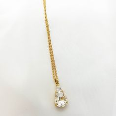 "A bridal silver necklace with a dainty CZ teardrop centerpiece. This romantic necklace features a NICKEL FREE high-quality silver-coated Swarovski teardrop crystal minimalist pendant with a silver necklace. This delicate necklace is perfect for a boho bride or bridesmaid who is looking for a stylish and classic look. You can choose your desired finish - Gold, Rose gold or Silver This necklace will compliment most kinds of brides dress tops, and can also be used on special occasions. Get this ne Gold Teardrop Crystal Necklace For Wedding, White Teardrop Drop Necklace For Party, White Crystal Teardrop Drop Necklace, Teardrop Pendant Crystal Necklace For Wedding, Teardrop Crystal Necklace For Wedding, Wedding Drop Crystal Necklaces, Elegant Teardrop Pendant Crystal Necklace For Wedding, Dainty Teardrop Bridal Necklace For Formal Occasions, Delicate Teardrop Drop Necklace For Party