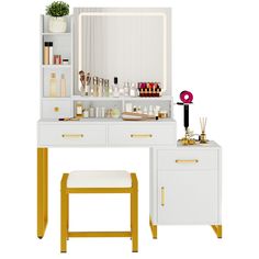 the vanity is white with gold trimmings and has a mirror, stool, and lights on it