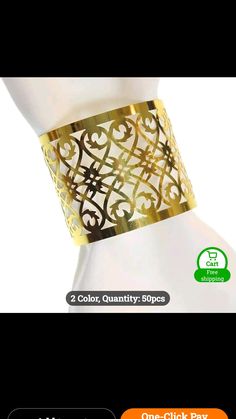 a gold cuff bracelet with an intricate design on the front and side, in two different colors