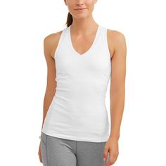 Athletic Works Racer Tank with Back Mesh is an easy to wear tank, whether you are exercising, running errands or watching those early morning soccer games. Made of our durable Cotton/Spandex fabric, it offers princess seams in front, DriWorks wicking to keep you dry and mesh piecing to keep you cool throughout the day. Comes in 4 great colors to match back to everything! Color: White. Gender: female. Age Group: adult. Workout Tops For Women, Best Tank Tops, Under Dress, Casual Tank Tops, Shelf Bra, Active Women, Womens Activewear, Active Wear Tops, Racerback Tank Top