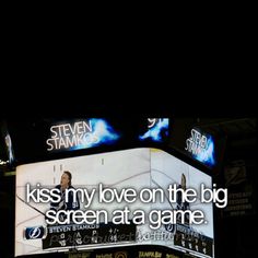 an image of a big screen at a game with the words kiss my love on the big screen at a game