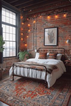 a bedroom with brick walls and lights strung from the ceiling, along with a large bed