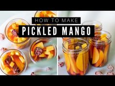 jars filled with pickled mangos on top of a table